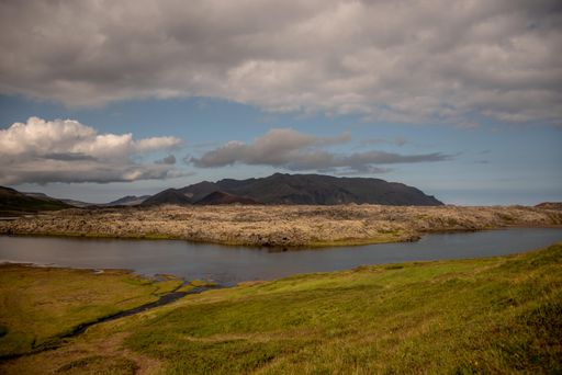 A beautiful landscape with the river and the dark hills in the distance.