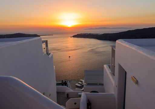 A sunset over Santorini as seen from Imerovigli. Cyclades, Greece