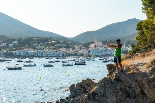 A young man on summer vacation in Cadaques by the sea, Costa Brava of Catalonia, Gerona