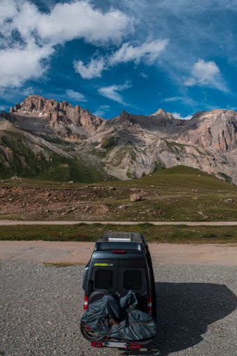 A minivan on summit of mount Galibier, above the Col du Lautaret, Alps