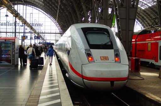 Passengers try to catch one of the few long-distance trains on a strike day. An ICE 4 of the Deutsche Bahn in Frankfurt main station against the light