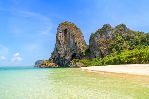 Ao Phra Nang near Railay beach with crystal clear water and exotic landmark limestone cliff mountain, Krabi, Thailand