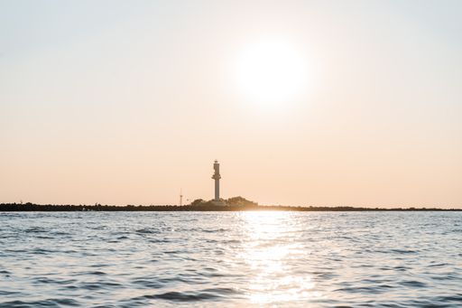 The sunset sky over the sea captured from a boat