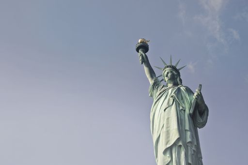 A beautiful low angle shot of the Statue of Liberty during daytime in New York