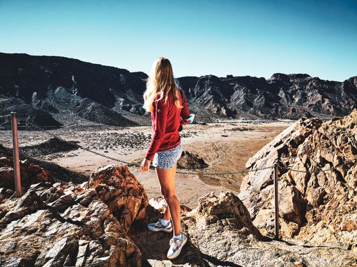A female traveler exploring the Teide National Park in Tenerife, Canary Islands, Spain
