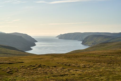 A beautiful shot of greenery-covered Nordkapp headland in Norway