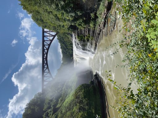 The Upper Falls And Genesee arch bridge at Letchworth State Park in New York, USA