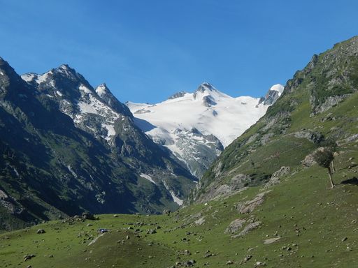 A lofty mountain covered in snow in the morning