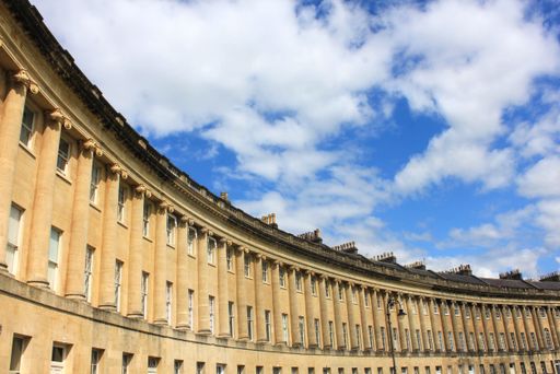Royal Crescent, Bath, England with blue sky background
