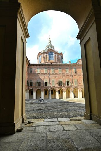 A vertical shot of the Savoy Royal Palace inner yard and Holy Shroud chapel Turin, Italy