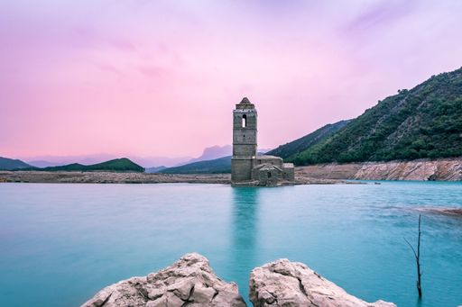 The ruins of the Mediano church in Huesca, Aragon, Spain by the sea during sunset