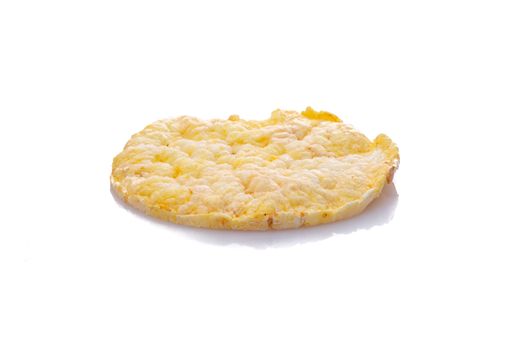 A closeup of corn maize quinoa waffle isolated on a white background