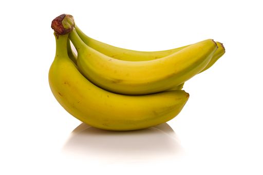 A closeup of fresh bananas isolated on a white background