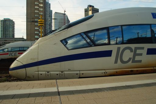Head of an ICE 3, named "Europe", in special livery with a stripe in Europe-blue instead of red or green in Frankfurt. Fittingly heading for Brussels.