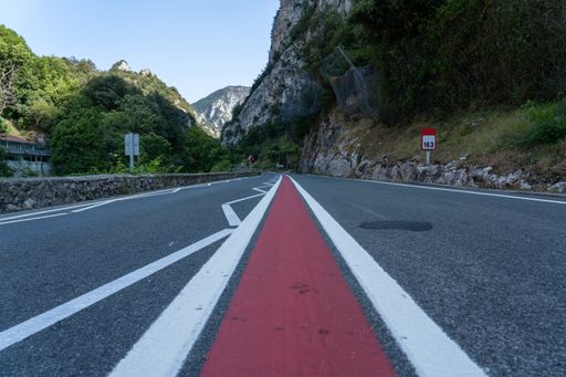 A closeup shot of a n endless road in a country