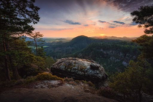 A mesmerizing view of a beautiful mountainous landscape at scenic sunset