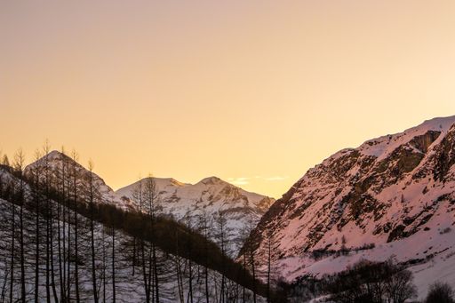 Beautiful Landscape Photograph of a sunset in the France Alps in the winter