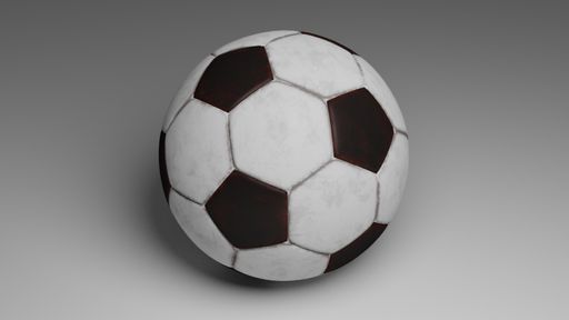 A closeup of a black and white soccer ball on a gray background