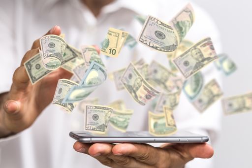 A 3D rendering of money rain with dollar banknotes