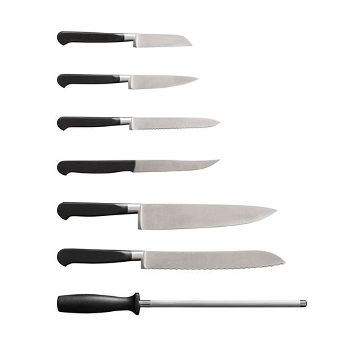 A vertical shot of a knife utensil set isolated on a white background