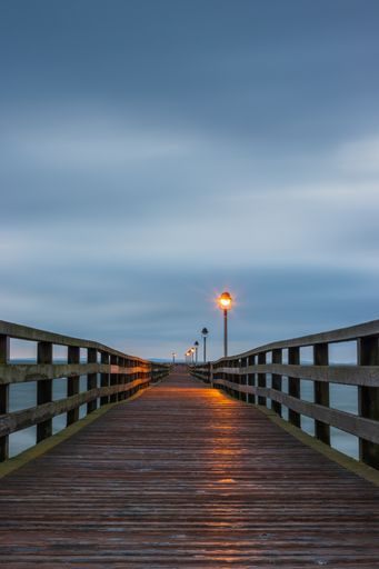 A vertical vanishing point shot of a pier in Lubmin, Baltic sea coast, Germany