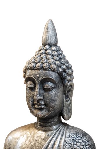 Face of buddha statue isolated on white background. Vertical shot.
