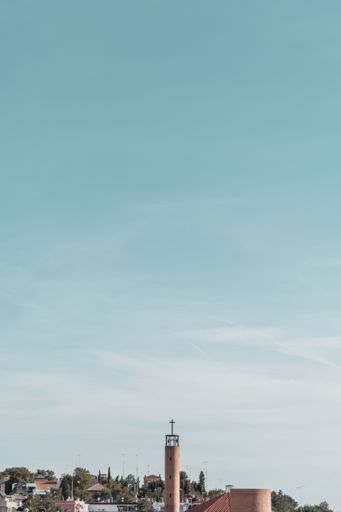A beautiful view of a minimal composition of a blue sky with a church