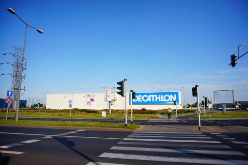 A pedestrian crossing leading to a Decathlon sport superstore