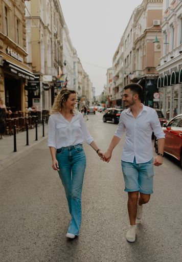 A loving Bosnian couple walking in the city streets