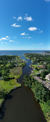 A vertical aerial view of the landscape of Bay Shore, Long Island, New York, the US, shot with a DJI Mavic 2 Pro drone