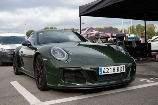 Front view of a beautiful green German sports car, the Porsche 911 991.2 Carrera 4 GTS