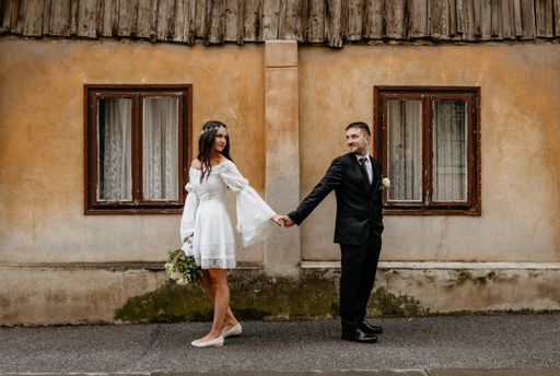 Wedding photo shoot in front of idyllic old house in city street at Gornji Grad in Zagreb, Croatia.