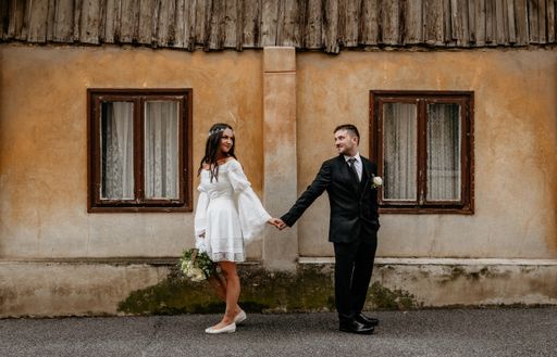 Wedding photo shoot in front of idyllic old house in city street at Gornji Grad in Zagreb, Croatia.