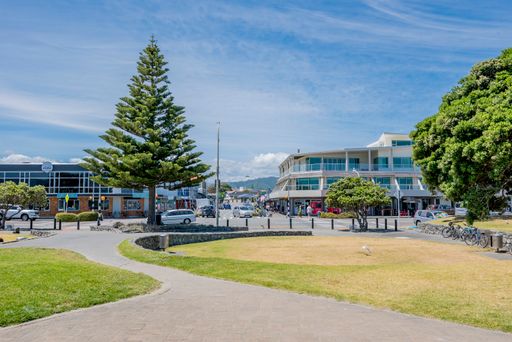 paraparaumu beach scenes and the shopping street on the beach parade with parklands and walkways leading to shops