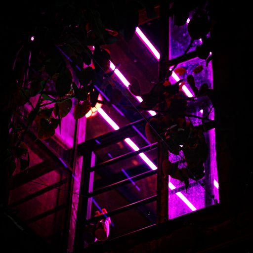 A low angle shot of a balcony with neon pink lights in the darkness