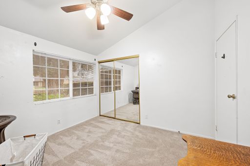 Various rooms of a suburban home including bedrooms, bathrooms, kitchen, and open living spaces with vaulted ceilings and ceiling fans.
