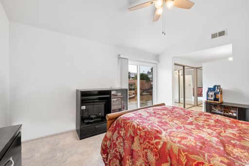 Various rooms of a suburban home including bedrooms, bathrooms, kitchen, and open living spaces with vaulted ceilings and ceiling fans.