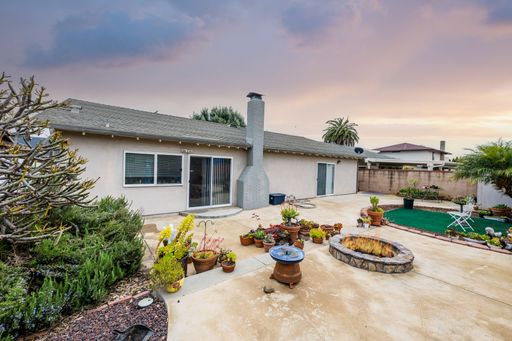 Various rooms of a suburban home including bedrooms, bathrooms, kitchen, and open living spaces with vaulted ceilings and ceiling fans.
