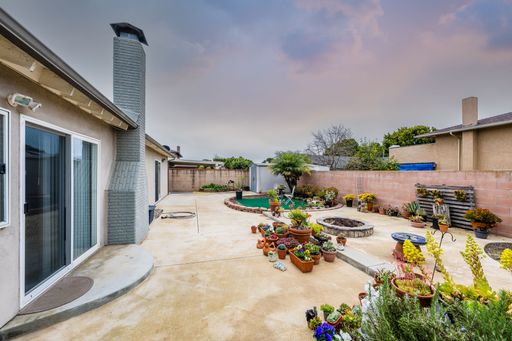 Various rooms of a suburban home including bedrooms, bathrooms, kitchen, and open living spaces with vaulted ceilings and ceiling fans.