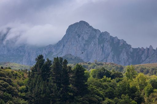 A beautiful shot of the Pyrenees mountains under the cloudy sky