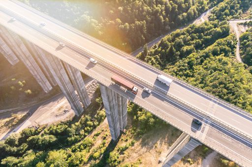 cargo delivery truck drive on highway aerial view high