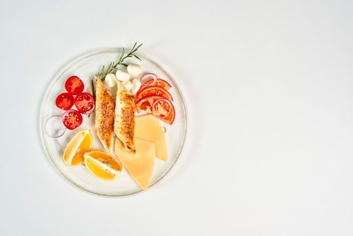 A top view of delicious healthy breakfast isolated on white background