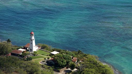 A View of Diamond Lighthouse and the Pacific Ocean from the top of Diamond Head Crater in Honolulu