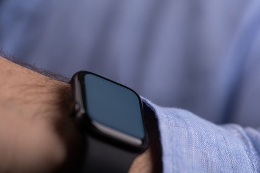 Close up of Businessman's hand looking at hand watch