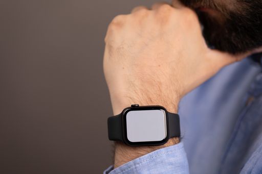 Close up of Businessman's hand looking at hand watch