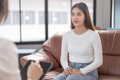 The young woman consulting with the psychologist.