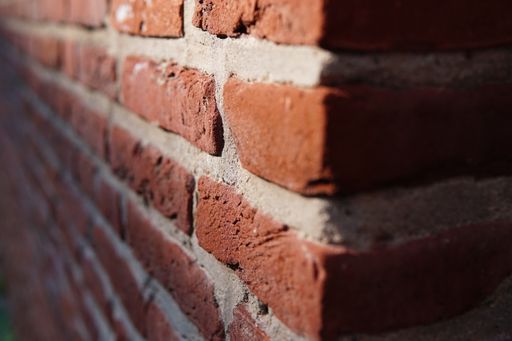 A selective focus shot of aged brick walls