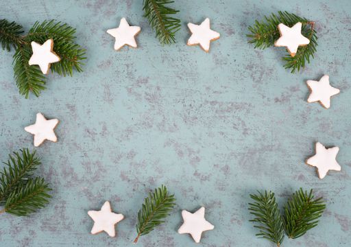 Cinnamon stars, traditional german christmas cookies, gingerbread, empty copy space, fir bran