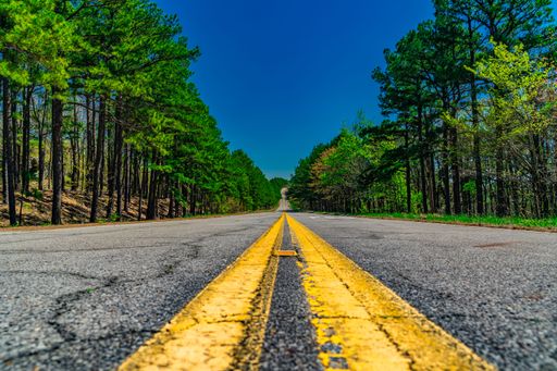 A scenic view of a wide open road on Talimena Scenic Byway in Oklahoma