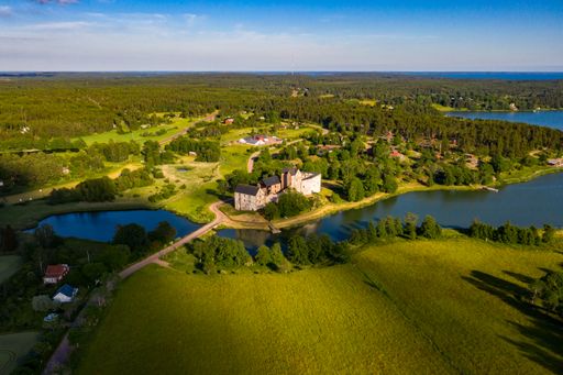 Aerial drone view of the Kastelholm castle, sunny summer evening, in Ahvenanmaa, Finland